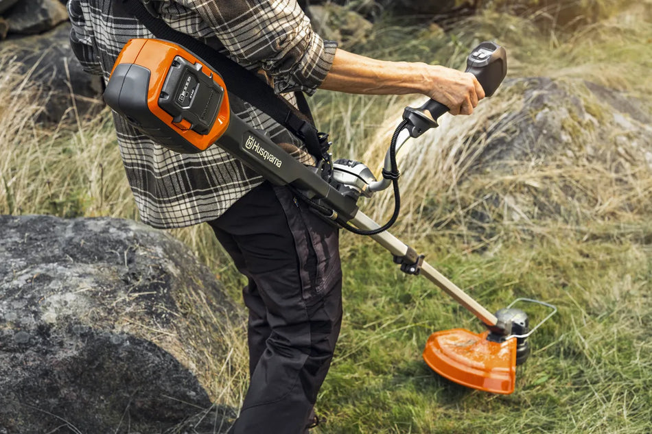 Husqvarna 220iR Grass Trimmer - Powerful and ergonomic trimmer designed for easy storage.